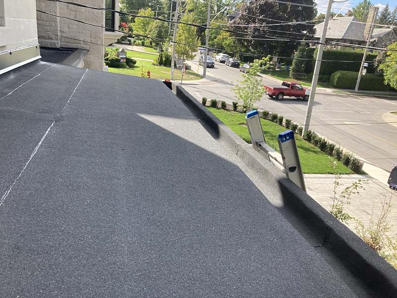 Finished residential flat roof at golden hour in Toronto
