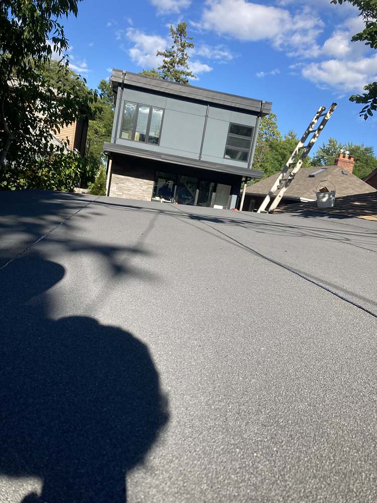 Clean new flat roof membrane installation in Toronto
