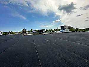 Commercial flat roof membrane split repair — Toronto